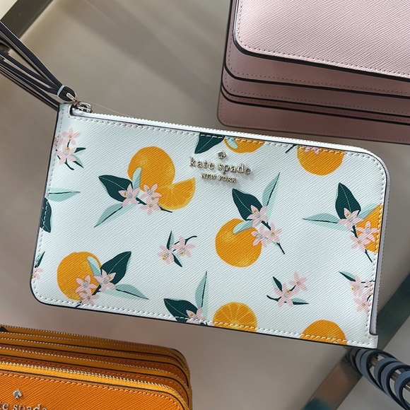 Kate Spade Lucy Orange Toss Printed Medium L-Zip Wristlet
Cream Multi
NWT - Picture 13 of 16